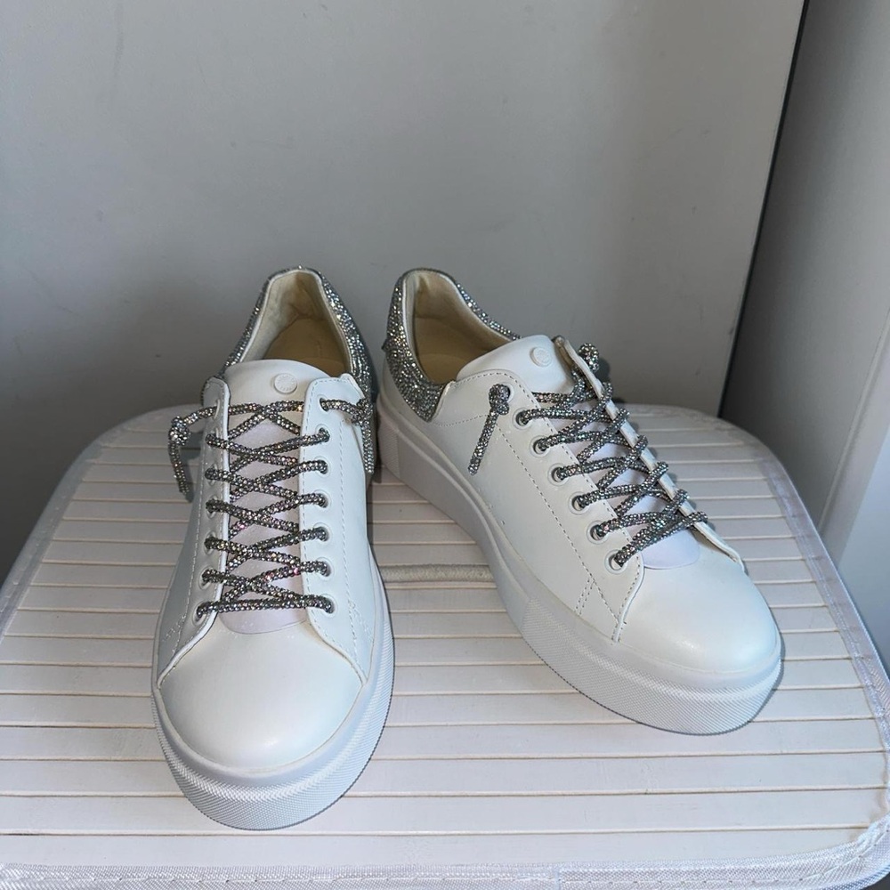 White and silver trainers with glittery laces